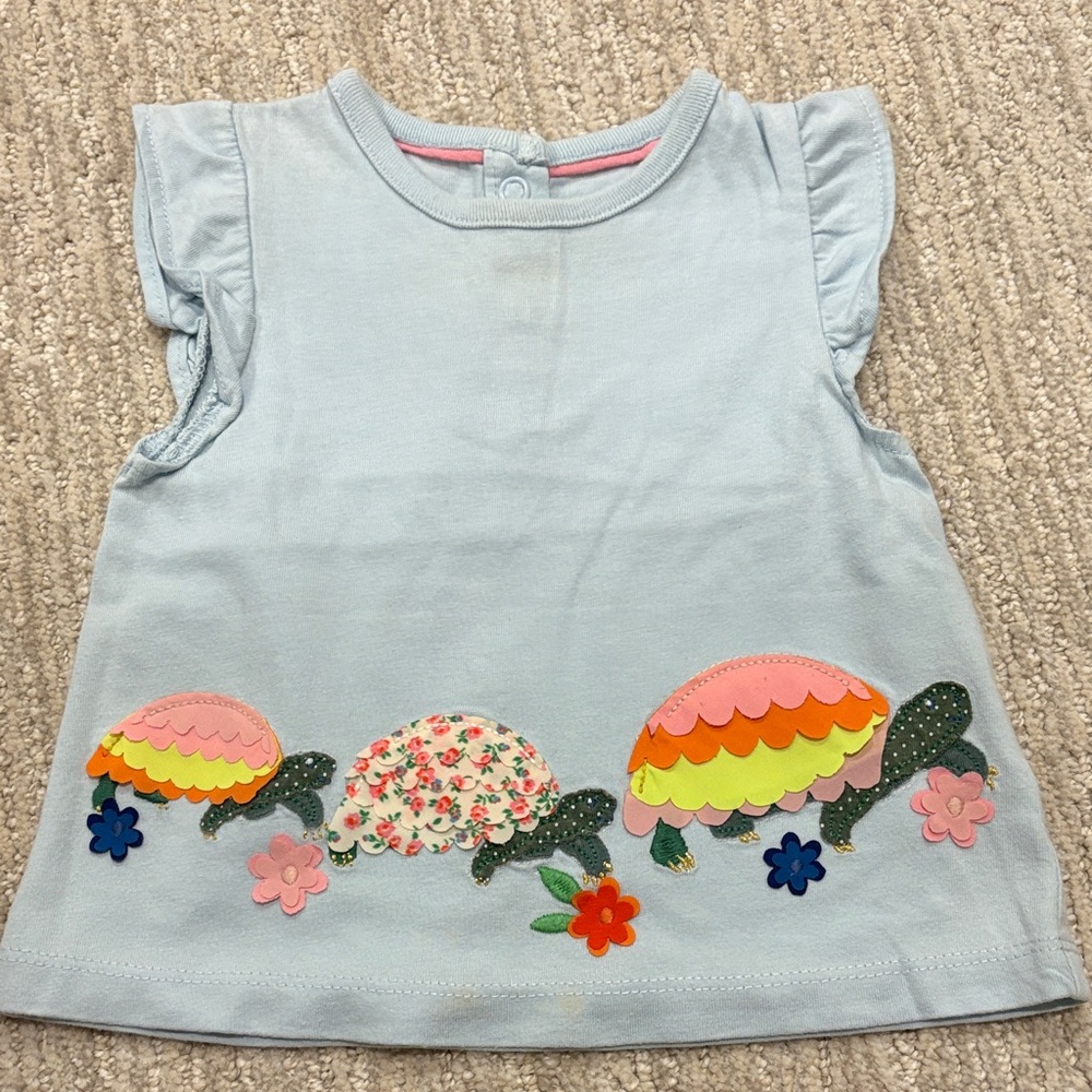 Baby Boden Sky Blue Tee with Floral Patterns